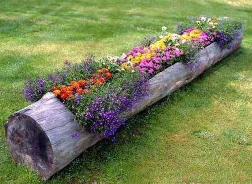 tronco-con-flores-decoraciones-de-jardines-rusticos